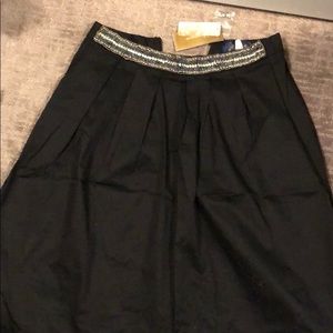 Cute midi skirt with beaded detail